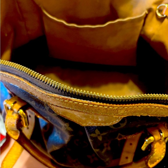 Pampered pre-owned Louis Vuitton Satchel.  Original lining can & a nicked strap.